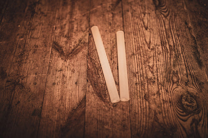 Les mailloches en verre enduites de silicone.