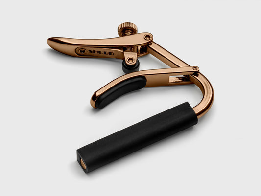 Capo Royale C2G pour guitares cordes nylon (touche plate), finition titane haute-qualité, doré rose