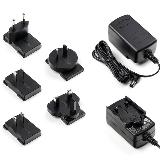 Alimentation 9V DC 1.3A, 100-240V, livrée avec cinq fiches interchangeables (EU/US/UK/CN/AU)